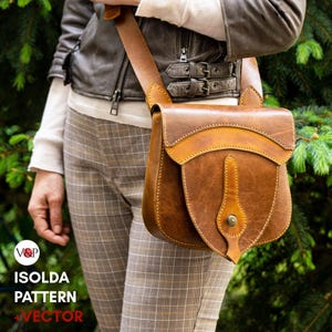Può includere: Una borsa a tracolla in pelle marrone con chiusura a patta e tracolla regolabile. La borsa presenta un design decorativo sul davanti e si indossa a spalla. L'immagine include anche il testo "ISOLDA PATTERN + VECTOR".