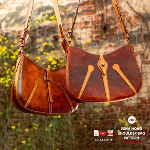 May include: Two brown leather hobo shoulder bags with adjustable straps and decorative light tan leather accents. The bags feature a central closure tab with a metal stud. Text at the bottom reads: V&P LUNA HOBO SHOULDER BAG PATTERN A0, A4, LETTER.