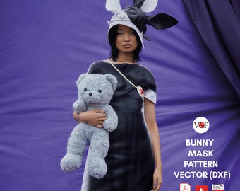 May include: A woman wearing a black and white bunny mask with large ears holds a gray teddy bear. The text "V&P Bunny Mask Pattern Vector (DXF) PDF A4, Letter" is below the image.