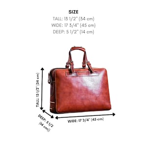 May include: A brown leather briefcase with a top handle and a buckle closure. The briefcase measures 34 cm tall, 45 cm wide, and 14 cm deep.
