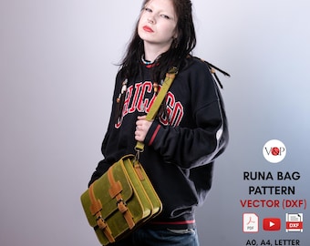 May include: A green leather messenger bag with brown leather accents and buckles. The bag has a long strap and is being worn by a person. The image also includes the text "RUNA BAG PATTERN VECTOR (DXF) AO, A4, LETTER".