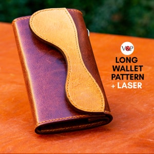 May include: A brown leather long wallet with a tan accent. The wallet has a unique design with a curved tan leather flap. The text "LONG WALLET PATTERN + LASER" is visible in the image.