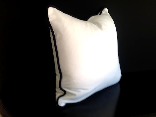 white pillowcase with black trim