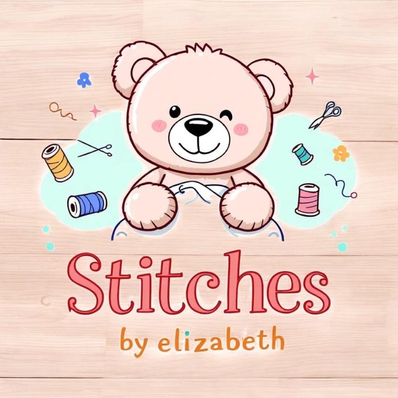 May include: A cartoon teddy bear winking, holding thread, with sewing notions like scissors and spools of thread. The text "Stitches by elizabeth" is displayed in a playful font, suggesting a craft or sewing business. The background is a light wood grain.
