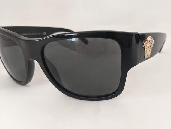 Vintage Authentic Versace Black Unisex Sunglasses. Black Frame with Gold Medusa. Made in Italy. MOD 4275 58 18 140