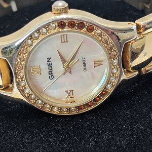 Vintage Gold Tone Women's Gruen Quartz Watch. Round Dial With Rhinestone Gold Tone Bracelet Gruen Vintage Watch. image 7