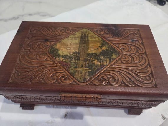 Vintage Dresser Carved Wood Box.  Hand Deeply Carved Swirl designs, Footed Wood Box.  Picture of Box Tower on Lid.