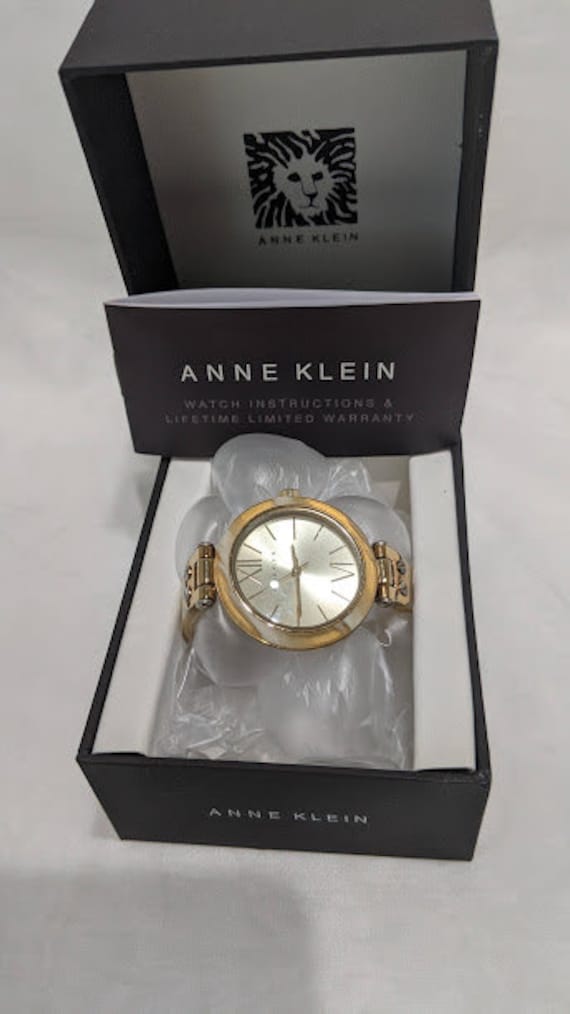 Anne Klein Ladies Horn Plastic Bangle Quartz Round Dial Watch