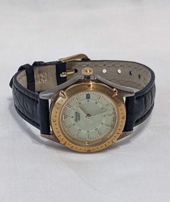 Women's Pulsar Gold Round Dial with Black Leather Wrist Band Quartz Watch.