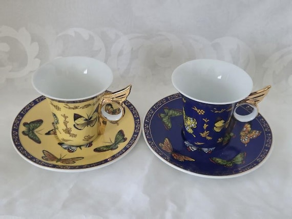 Vintage L Dake en Zn Porcelain Set of Two Porcelain Teacups and Saucers.  Blue and Yellow Butterfly Motif Teacups.