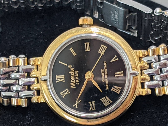 Mondu Japan Quatz Two/Tone Women's Watch. Black round Dial Watch. Flat / Thin Two/Tone Bracelet Ladies Watch