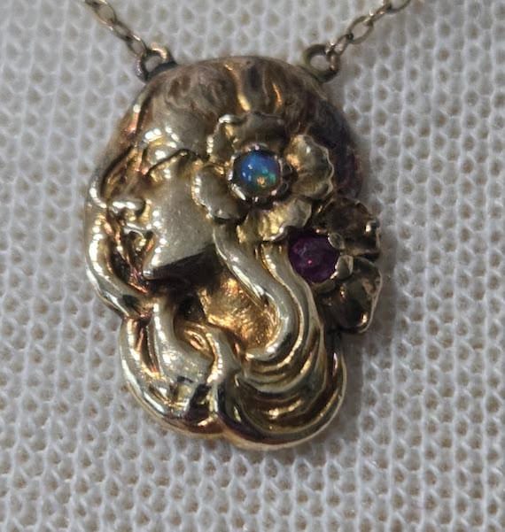Antique Art Nouveau Style Women 14K Pendant Necklace. Women Pendant with Flowing Hair with Inset gemstone Circa 1910