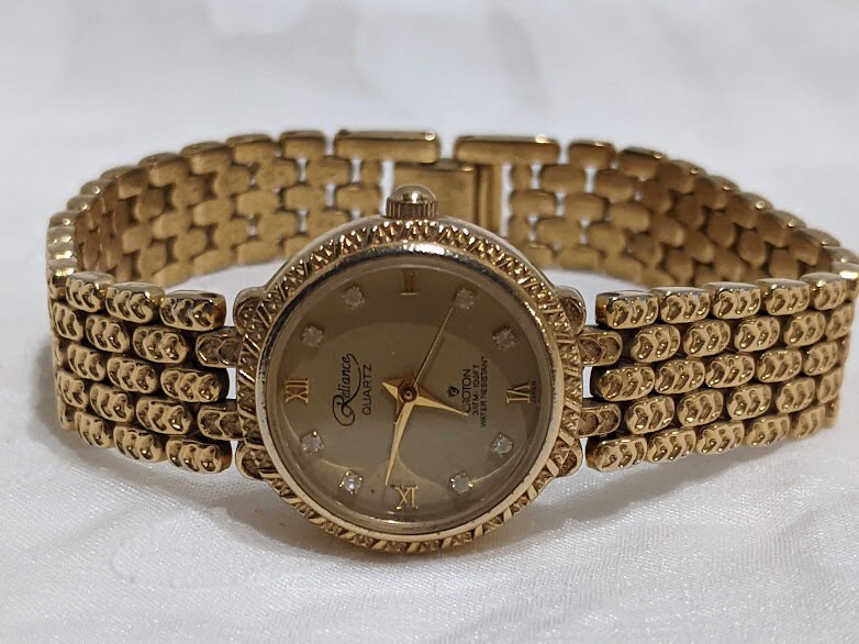 Reliance watch croton quartz diamond outlet