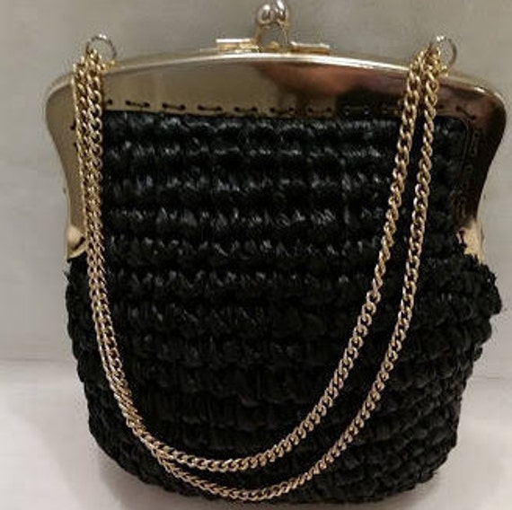 black woven purse