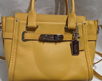 Coach Swagger Mini Handbag.  Coach Crossbody Yellow Pebble Leather. NOW ON SALE