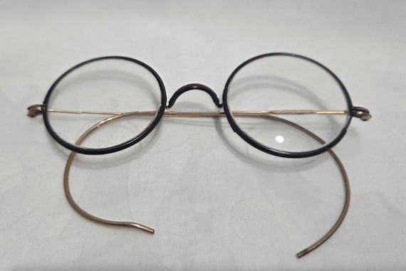 Vintage Small Round Eyeglasses with Thin cable wire.