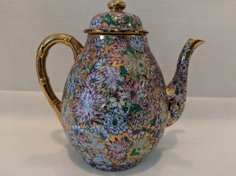 Antique Porcelain Japanese Coffee/Tea Pot. Polycrome Enamel Leaf