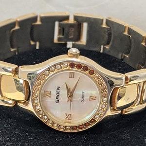 Vintage Gold Tone Women's Gruen Quartz Watch. Round Dial With Rhinestone Gold Tone Bracelet Gruen Vintage Watch. image 1