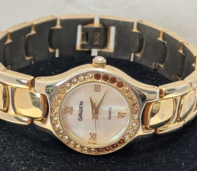 Vintage Gold Tone Women's Gruen Quartz Watch. Round Dial With Rhinestone Gold Tone Bracelet Gruen Vintage Watch. image 1