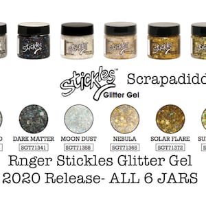 May include: Six jars of Stickles Scrapadiddy Glitter Gel in the colors Asteroid, Dark Matter, Moon Dust, Nebula, Solar Flare, and Supernova. Each jar has a corresponding color swatch below it. The text "Rnger Stickles Glitter Gel 2020 Release - ALL 6 JARS" is below the swatches.