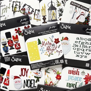 May include: A collection of Sizzix Tim Holtz holiday-themed crafting die and embossing folder sets. The packaging features illustrations of Santa Claus, snowmen, nutcrackers, lanterns, candles, wreaths, and festive text like Merry and Bright.