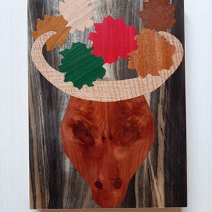 Horned animal skull with flowers wall hung art made with exotic wood veneer