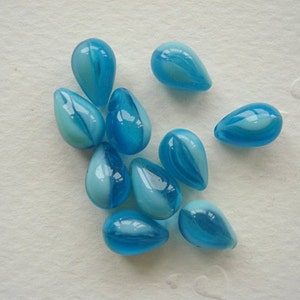 6 mm x  8 mm  Czech  Glass Beads.  Made in Czech Republic, (pkg. of 20)