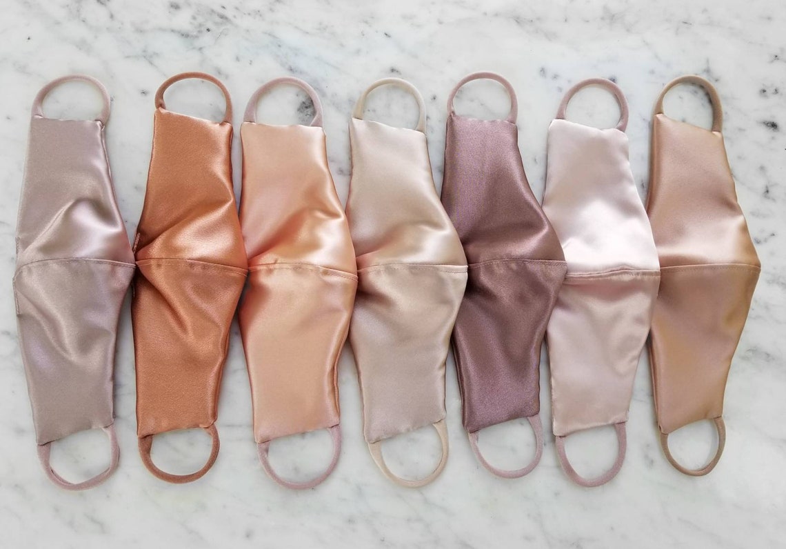 Satin face masks in nude colors.