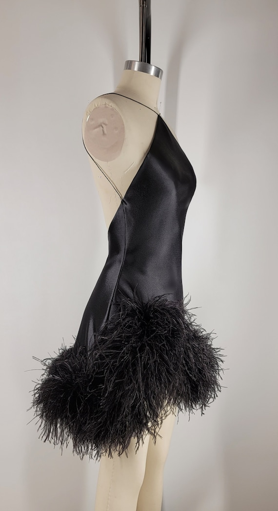 black asymmetric volume sleeve draped feather mini dress FIN some feathers might fall Color:Black Floral Print 23 Ideas For Building Type_Dressers & Armoires