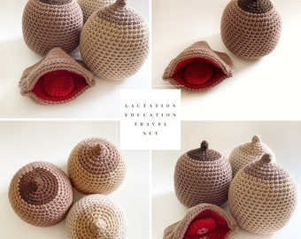 May include: A lactation education travel set consisting of multiple crocheted breast models in various skin tones. Each model features a textured surface and a pointed nipple. One model is shown open, revealing a red interior with clear buttons.