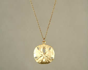 Gold sand dollar necklace - delicate necklace - a dainty gold sand dollar hanging from a 14k gold  vermeil chain