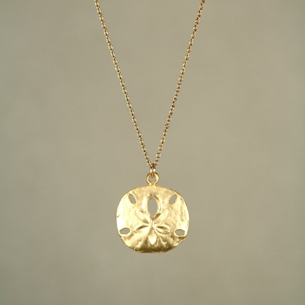 Gold sand dollar necklace - delicate necklace - a dainty gold sand dollar hanging from a 14k gold  vermeil chain