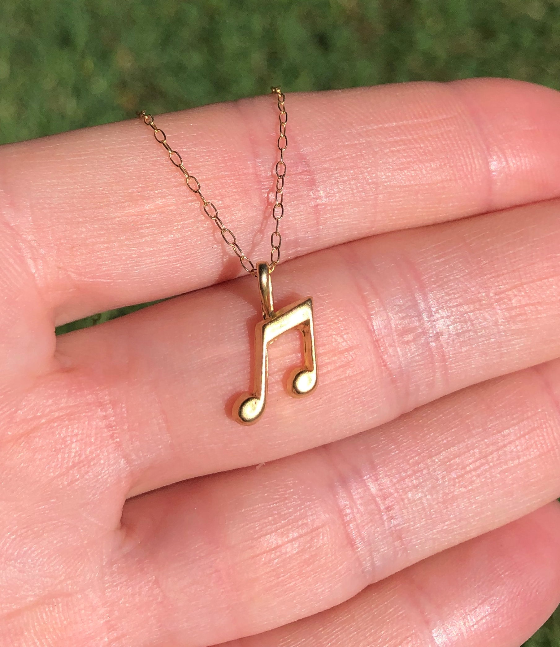 Music pendant gold clearance