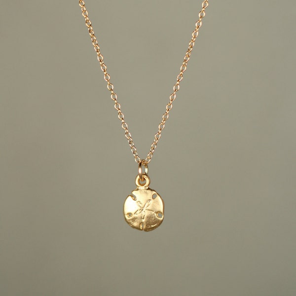 Gold sand dollar necklace - delicate necklace - a tiny 14k gold vermeil sand dollar hanging from a 14k gold filled chain