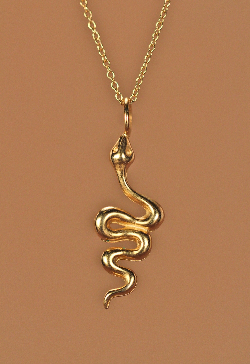 Celebrities Wearing Snake Necklaces
