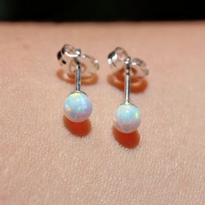 Opal earrings - opal ball earrings - opal stud - opal ball studs - fire opal - a set of white fire opal balls set onto sterling silver posts