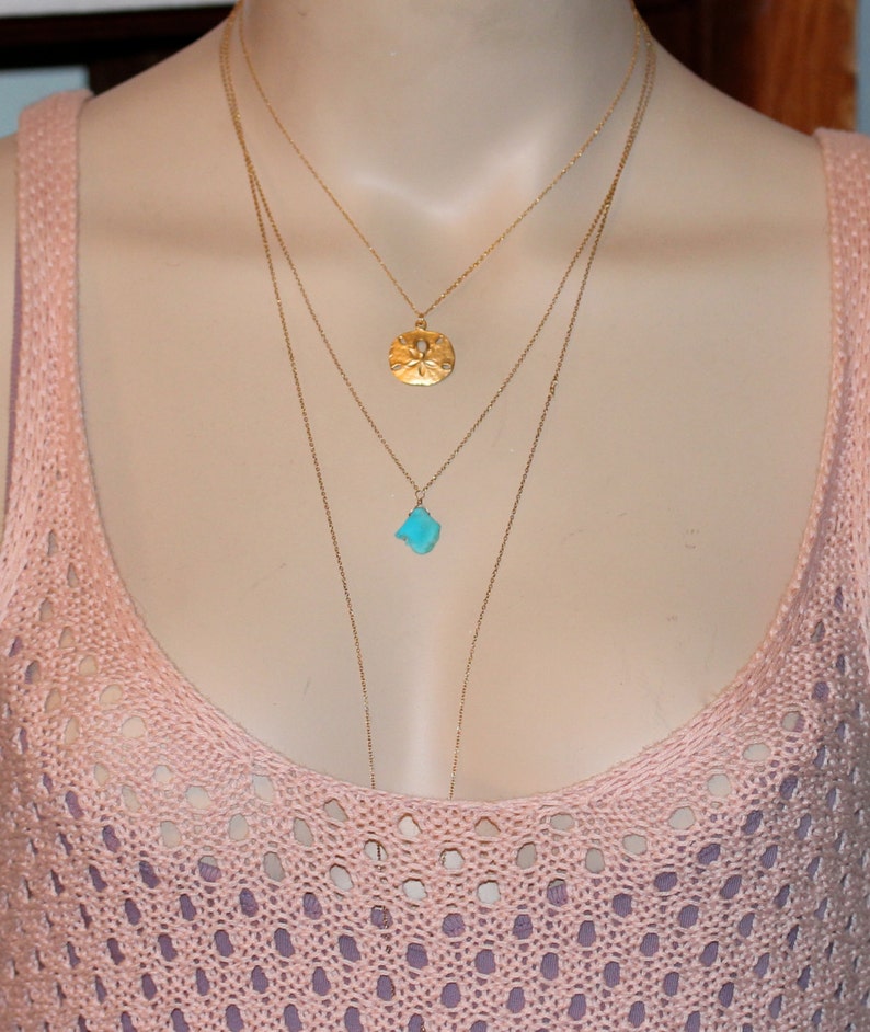 Halsband med guldsanddollar - fint halsband - en nätt guldsanddollar som hänger från en kedja i 14 karat guld med vermeil-motiv bild 3