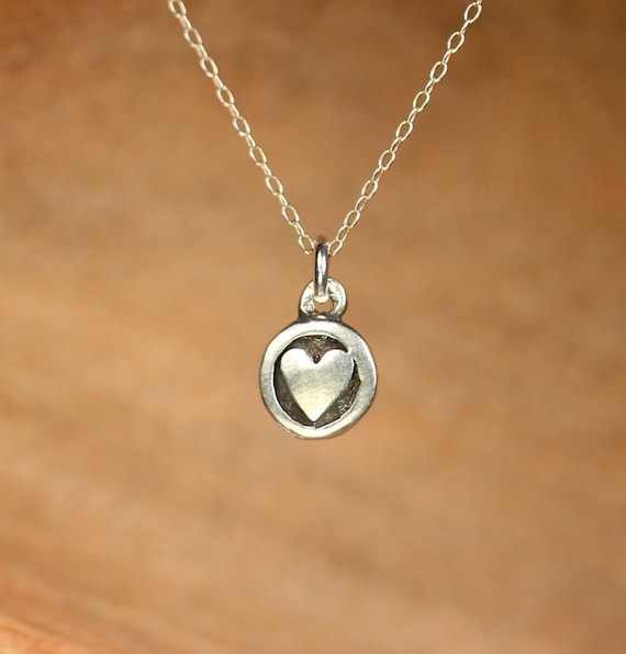 Tiny silver heart necklace - heart stamp necklace - disc necklace - a sterling silver heart charm on a sterling silver chain