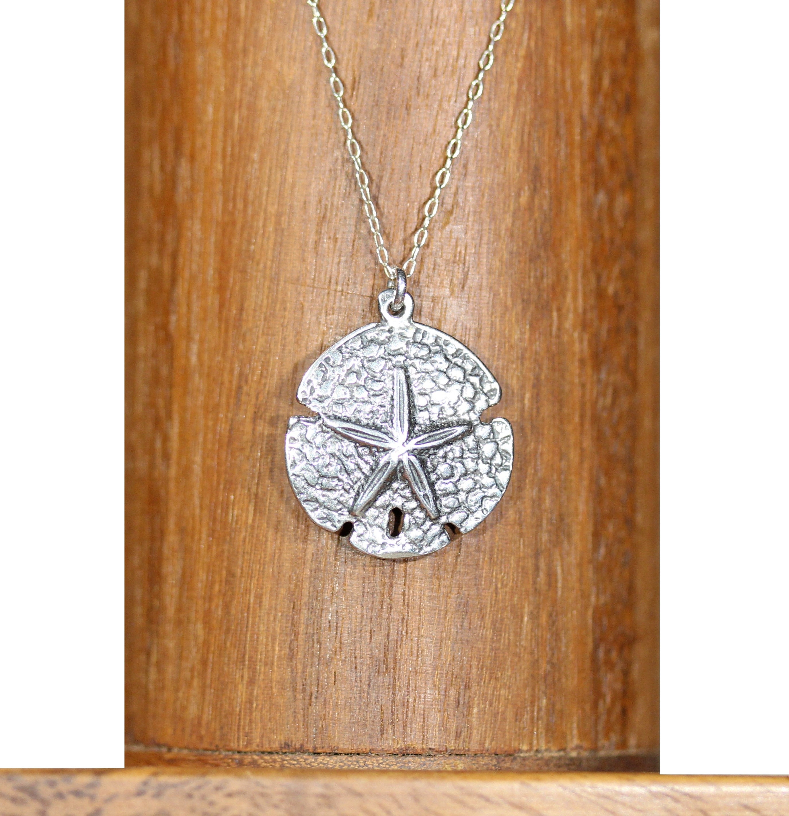 Silver sand shop dollar necklace