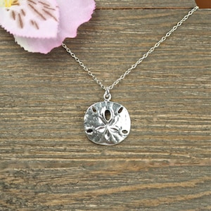 Silver sand dollar necklace - delicate necklace - a dainty sterling silver sand dollar hanging from a sterling silver chain