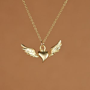 Flying heart necklace, silver heart pendant with wings, wing necklace, a 14k gold vermeil heart and wings on a 14k gold filled chain