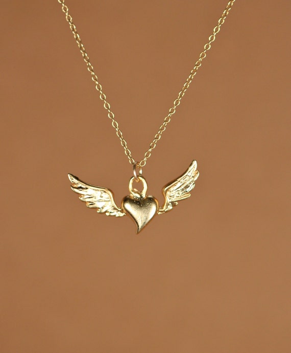 Flying heart necklace, silver heart pendant with wings, wing necklace, a 14k gold vermeil heart and wings on a 14k gold filled chain