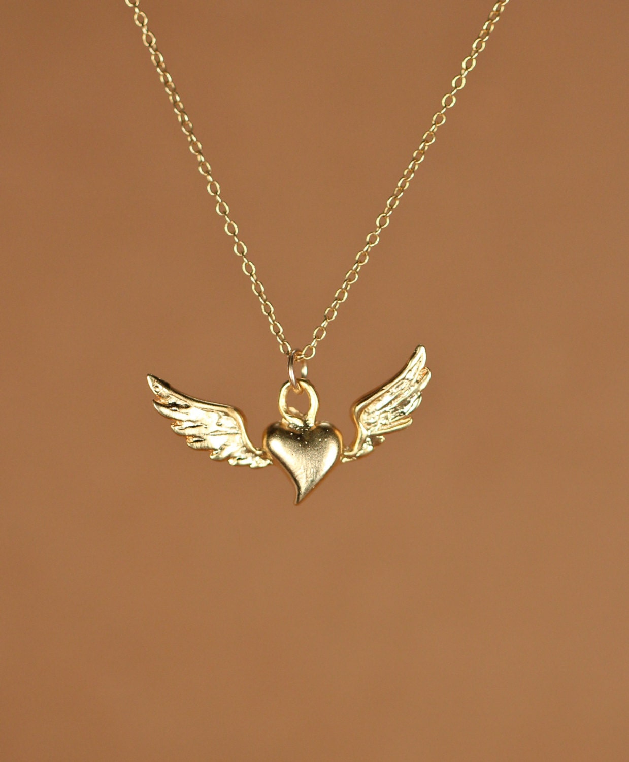 Flying heart necklace, silver heart pendant with wings, wing necklace, a  14k gold vermeil heart and wings on a 14k gold filled chain