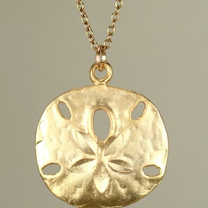 Gold sand dollar necklace delicate necklace a dainty gold sand dollar hanging from a 14k gold vermeil chain image 4