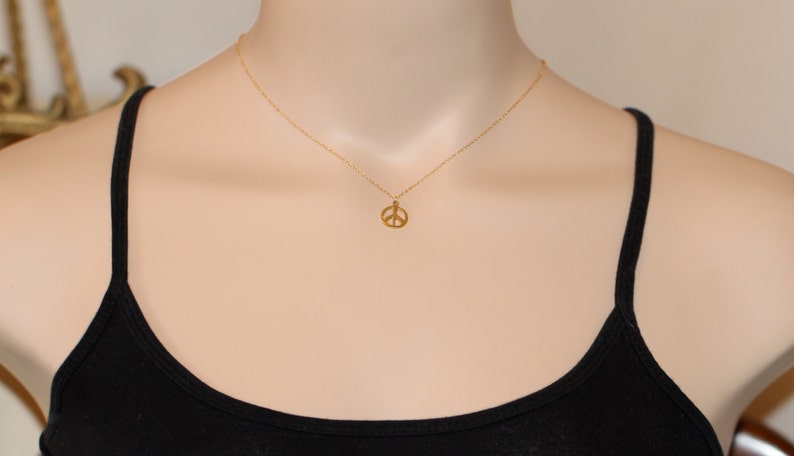 Gold peace sign necklace peace necklace delicate and dainty a 14k gold plated little gold peace symbol on a 14k gold filled chain image 3
