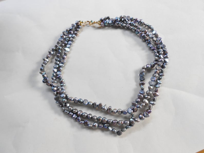 Vintage pebble necklace finished in abalone 3 strands of twisted tiny iridescent rocks