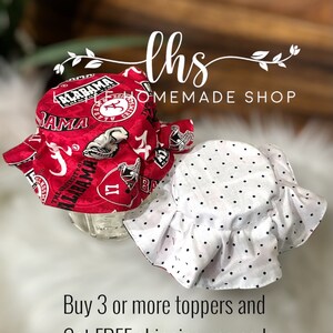 May include: Two fabric jar toppers. One is red with a white and black Alabama Crimson Tide pattern. The other is white with black polka dots. The text "lhs OMEMADE SHOP" is visible in the image. The text "Buy 3 or more toppers and Get FREE shipping use code: MoreAndSave3 at checkout" is also visible.