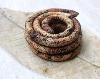 SPIRALOCKS®  ORIGINAL bendable dread tie. skeleton LEAF vegan. Handmade in Gunu village supporting village families.