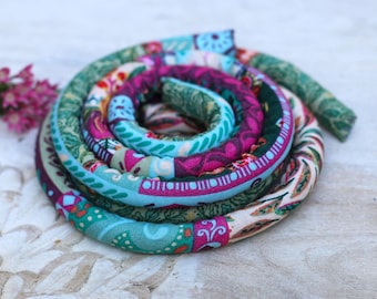 SPIRALOCKS® ORIGINAL bendable dread tie. FOSSICK.  handmade Gunu village supporting village families.