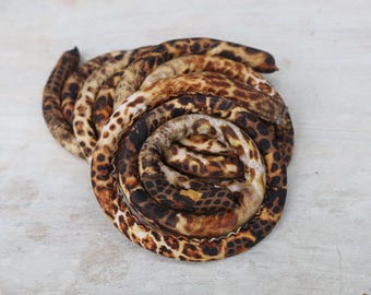 SPIRALOCKS®  ORIGINAL bendable dread tie. WILD vegan. Handmade in Gunu village supporting village families.